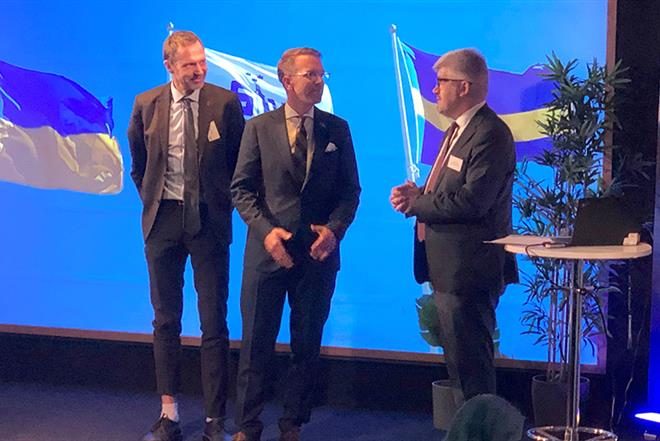 Jens Holm, Andreas Carlson and Andrii Plakhotniuk on stage