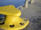 Close-up of a yellow bollard