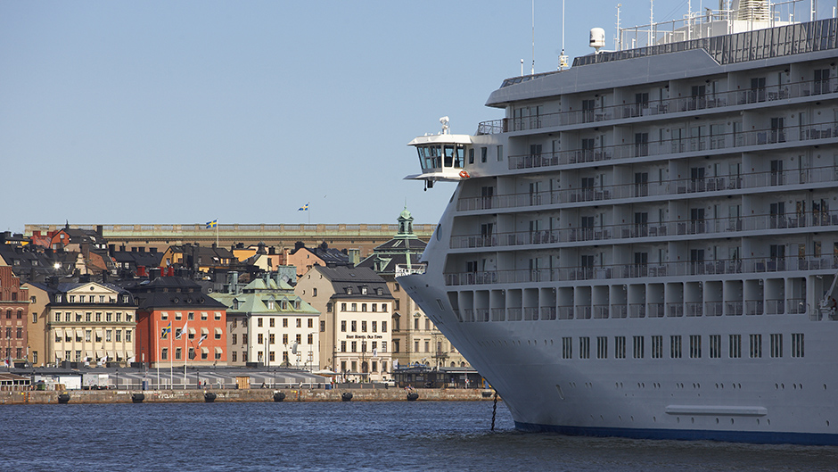 Cruise ship in the foreground and Stockholm Old Town in the background