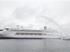 The vessel Ambiance receives a water salut