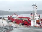 Barge for stone at the quay at Stockholm Norvik Port